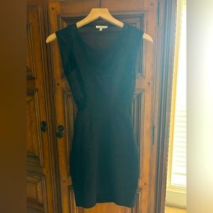 Body con black mini dress with cutouts with mesh